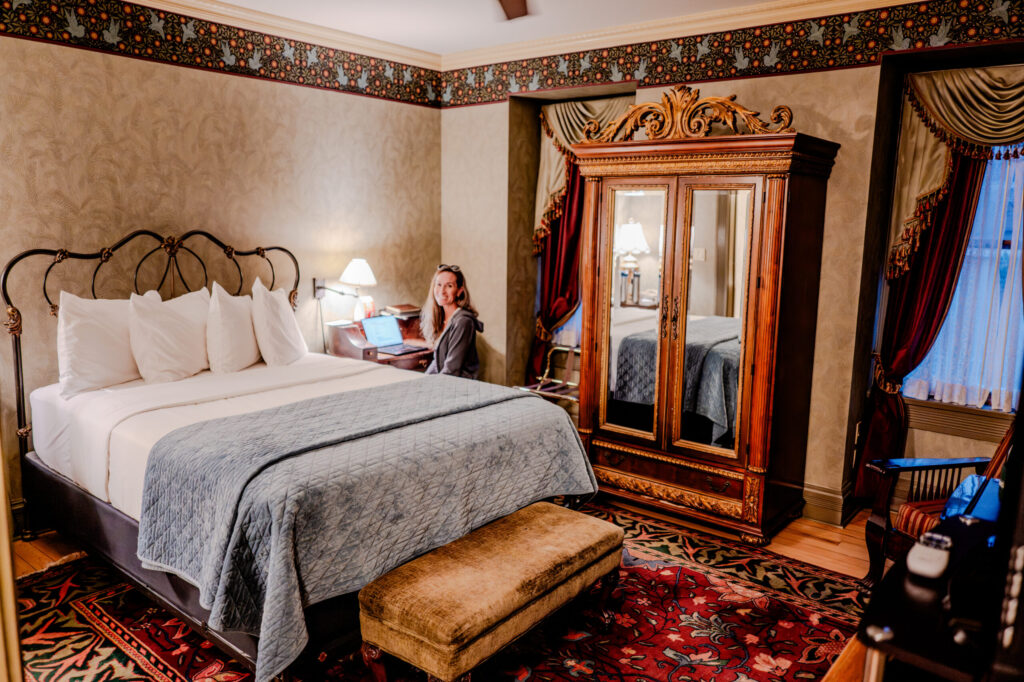 Carrie at Secretary Desk in Beaumont Suite — Ouray, Colorado (2026)