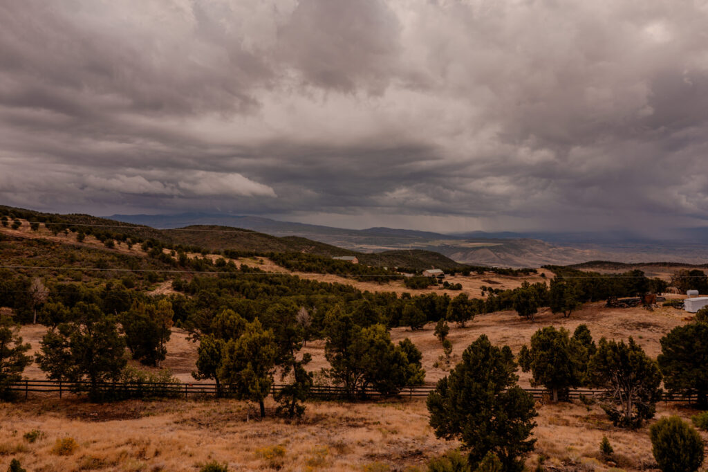 Pinyon-Juniper Plateau & Distant Storm Cells — Montrose, Colorado (2026)